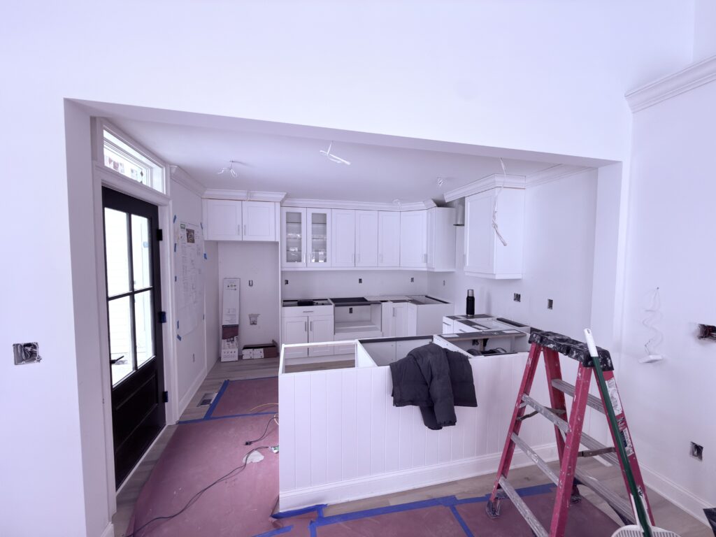 White shaker kitchen cabinet installation - Action Construction