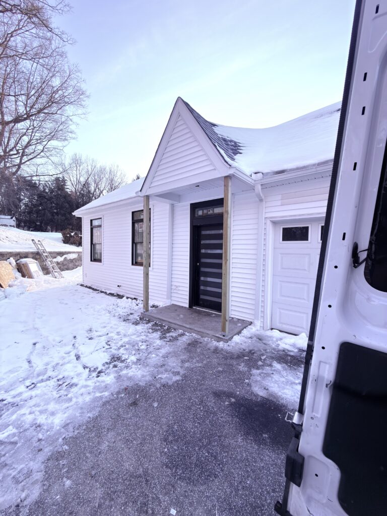 New covered entry and front porch addition - Action Construction